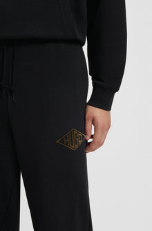 HUGO COTTON-TERRY TRACKSUIT BOTTOMS WITH EMBROIDERED LOGO